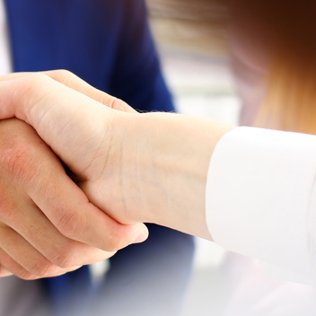 Two Businesspeople zoomed in on handshake